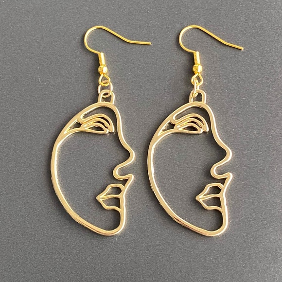 Jewelry - NEW Human Face Earrings in Gold color